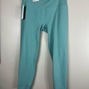 Ododas xlarge new with tag 14w 10”rise 24 inseam. Work out. Yoga pants